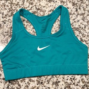Size small Nike sports bra. Slight green hue